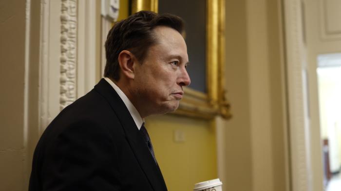 WASHINGTON, DC - DECEMBER 05: Tesla CEO Elon Musk, Co-Chair of the newly announced Department of Government Efficiency (DOGE), arrives on Capitol Hill on December 05, 2024 in Washington, DC. Musk and his Co-Chair, businessman Vivek Ramaswamy are meeting with lawmakers today about DOGE, a planned presidential advisory commission with the goal of cutting government spending and increasing efficiency in the federal workforce. (Photo by Anna Moneymaker/Getty Images)