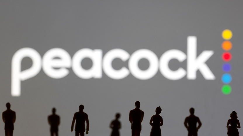 Toy figures of people are seen in front of the displayed Peacock logo, in this illustration taken January 20, 2022. REUTERS/Dado Ruvic/Illustration