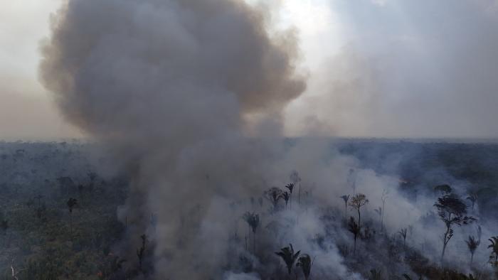 Aerial view of an illegal fire in the Amazon rainforest on the banks of the BR-230 (Transamazon Highway), near the city of Labrea, Amazonas state, northern Brazil, taken on September 4, 2024. Forest fires have been raging for several weeks in Brazil, particularly in the Amazon rainforest in the north and the immense Pantanal wetland in the center-west of the country. (Photo by MICHAEL DANTAS / AFP) (Photo by MICHAEL DANTAS/AFP via Getty Images)