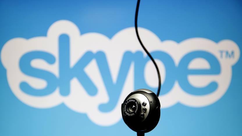 A web camera is seen in front of a Skype logo in this photo illustration taken in Zenica, May 26, 2015. Online communication service Skype has been summoned to appear in court in Belgium after refusing to pass on customer data to aid a criminal investigation, a court spokesman said. A court in Mechelen, just north of Brussels, had asked for data from messages and calls exchanged on Microsoft-owned Skype, arguing that telecom operators in the country were required to do so. REUTERS/Dado Ruvic