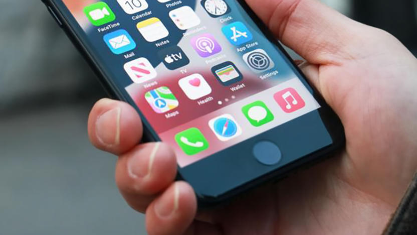 A closeup of the iPhone SE (2022) in hand.