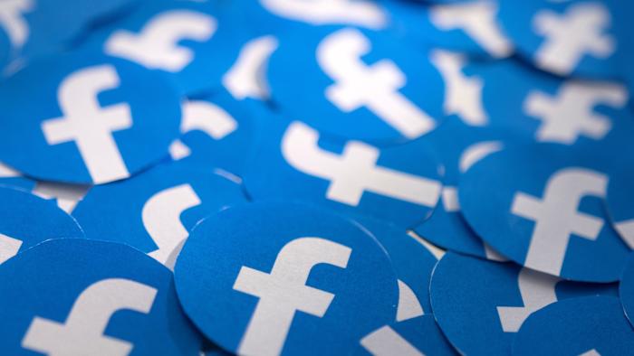 Printed Facebook logos are seen in this illustration taken February 15, 2022. REUTERS/Dado Ruvic/Illustration