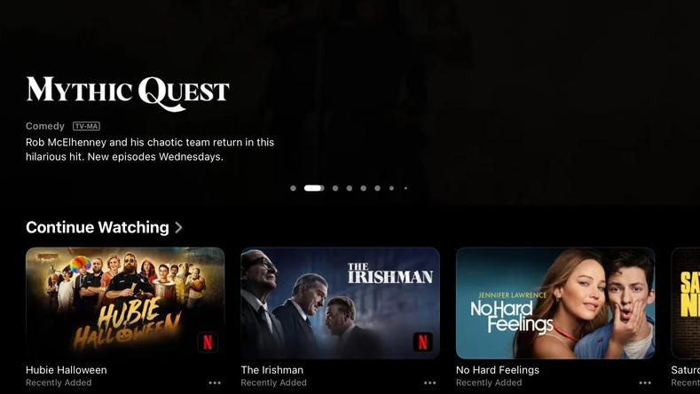 Screenshot of Netflix integration in the Apple TV app for iPad. Various shows highlighted.