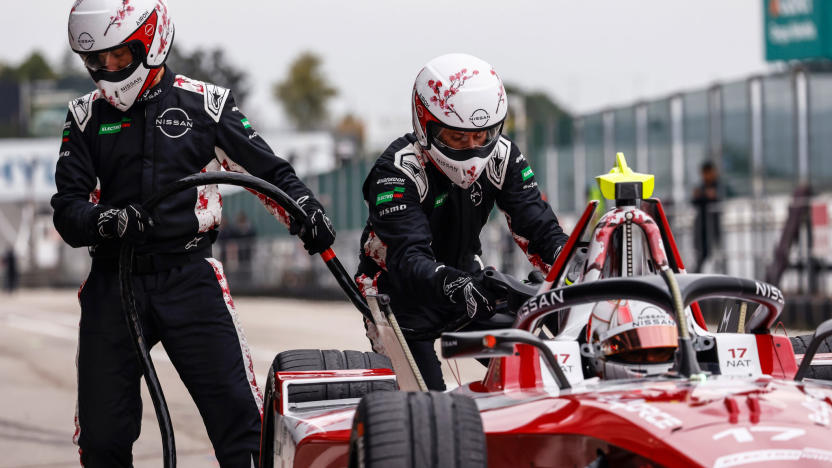 MADRID, SPAIN - NOVEMBER 07: Mechanics plug the charger into the car of Norman Nato of France and Nissan Formula E Team during day three of Formula E Pre-Season Testing at Circuito del Jarama on November 07, 2024 in Madrid, Spain.