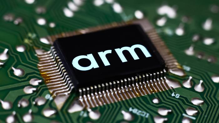 Microchip and Arm logo displayed on a screen are seen in this multiple exposure illustration photo taken in Krakow, Poland on September 14, 2023. (Photo by Jakub Porzycki/NurPhoto via Getty Images)