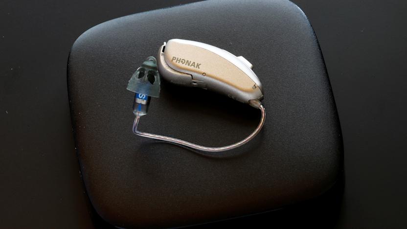 A Phonak Audeo B-Direct hearing aid of Swiss manufacturer Sonova lies on a Phonak TV Connector device in Staefa, Switzerland August 16, 2017. REUTERS/Arnd Wiegmann