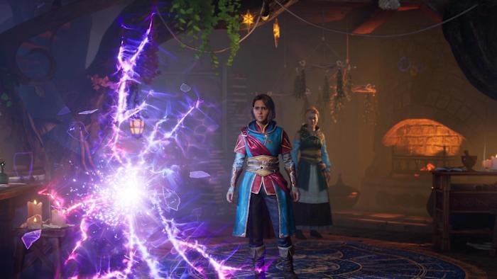 A screenshot of a video game showing two people wearing fantasy clothing.