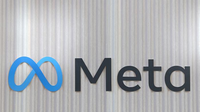 FILE PHOTO: The logo of Meta is seen at the entrance of the company's temporary stand ahead of the World Economic Forum (WEF) in Davos, Switzerland January 18, 2025. REUTERS/Yves Herman/File Photo