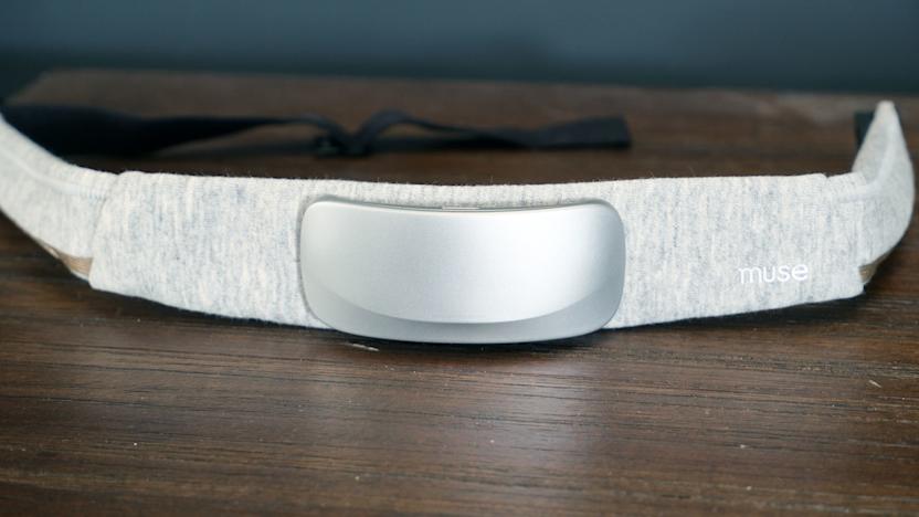 Image of the Muse S Athena wearable EEG on a brown wood table