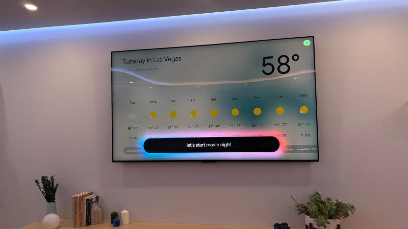 Google TV with Gemini demo showing a tv displaying the weather and a prompt to start movie night. 