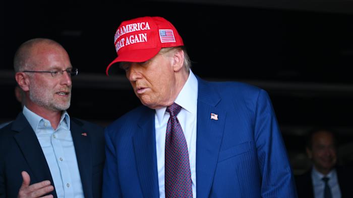 BROWNSVILLE, TEXAS - NOVEMBER 19: U.S. President-elect Donald Trump speaks to Brendan Carr, his intended pick for Chairman of the Federal Communications Commission, as he attends a viewing of the launch of the sixth test flight of the SpaceX Starship rocket on November 19, 2024 in Brownsville, Texas. SpaceX’s billionaire owner, Elon Musk, a Trump confidante, has been tapped to lead the new Department of Government Efficiency alongside former presidential candidate Vivek Ramaswamy. (Photo by Brandon Bell/Getty Images)