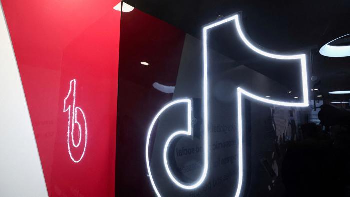 Logos of TikTok are seen at the TikTok house on the opening day of the 55th annual meeting of the World Economic Forum (WEF) in Davos, Switzerland, January 20, 2025. REUTERS/Yves Herman/File Photo