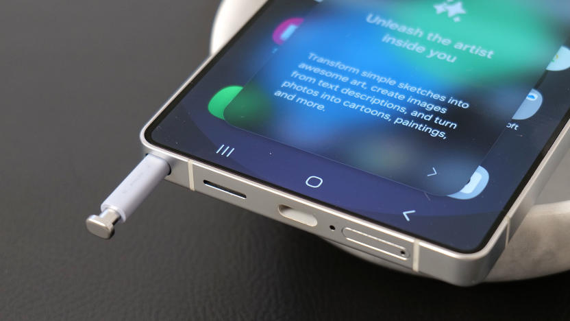 An S Pen sticking out of its slot on the bottom left corner of a Galaxy S25 Ultra.