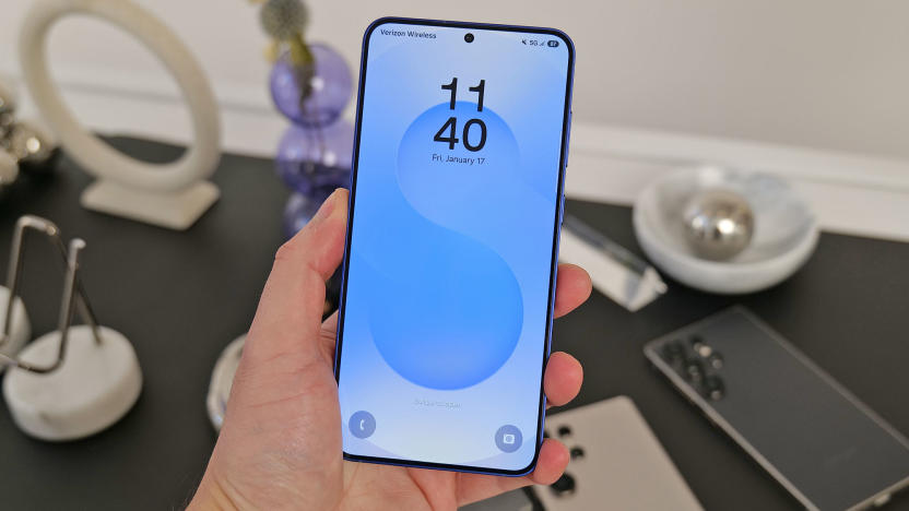 Photo of the Samsung Galaxy S25+ in hand at a product demo.