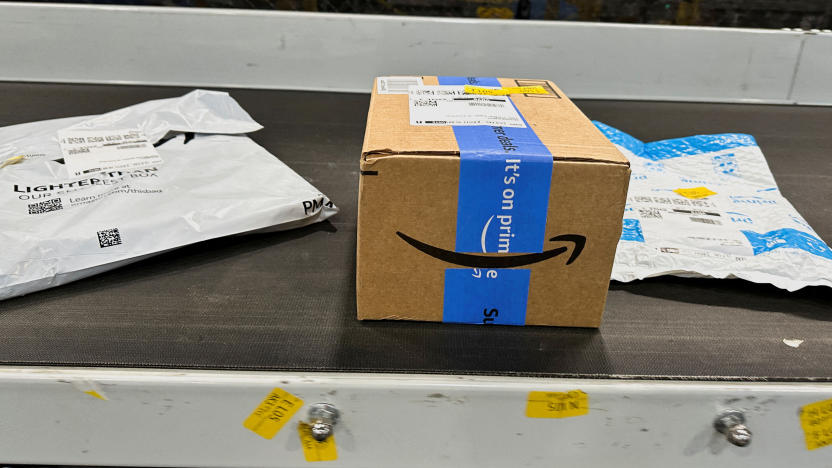 Packages are transported on a conveyor belt at the Amazon warehouse, busy on Prime Day, in Melville, New York, U.S., July 11, 2023. REUTERS/Soren Larson   REFILE - CORRECTING MONTH
